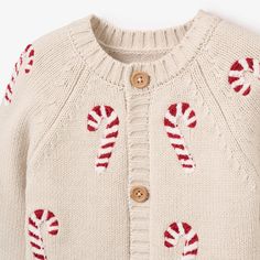 Our candycane cardigan set is both cozy and festive and it's sure to get you in the holiday spirit. Not only is it the perfect weight for winter, but it also has beautiful chenille textured details you can't get anywhere else. 100% cotton knit 3 piece set Chenille candycanes Machine wash delicate, Do not bleach, Tumble dry normal low heat, iron low Jumpsuit And Cardigan, Holiday Cardigan, Striped Hat, Personalized Hats, Cardigan Set, Elegant Baby, Holiday Set, Holiday Baby, Hat Set