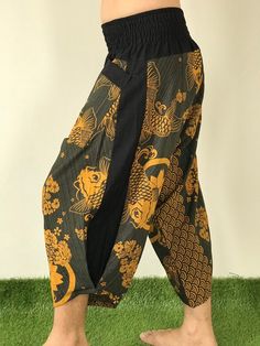 "Samurai Pants, elastic waist Samurai Pants Unisex Elastic Waist, ninja pants Samurai Pants (Unisex) Elastic Waist MATERIAL: 100% Cotton APPROX MEASUREMENT: Elastic Waist :24\"- 40\" Length :34\" Hip up to :52\" Around Ankle: 18 inch Pockets: x 2 Material : Cotton ♥ PAYMENT We accept payments via PayPal only. ♥ Shipping : - All items will be shipped within 1 business day after received payment. We ship items via DHL Express. ♥ Delivery Time : USA only 2 business days Canada: 2- 3 business days F Traditional Black Bottoms For Spring, Traditional Spring Pants With Pockets, Casual Pants With Elastic Waistband For Festivals, Traditional Spring Bottoms With Pockets, Traditional Black Harem Pants With Elastic Waistband, Traditional Style Baggy Pants For Spring, Traditional Baggy Pants For Spring, Traditional Baggy Bottoms For Festivals, Traditional Baggy Bottoms For Spring