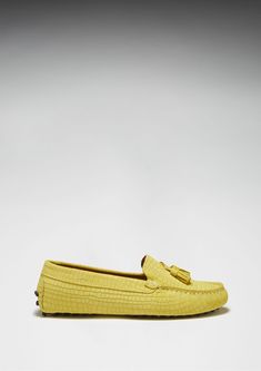 Hugs & Co. yellow tasselled loafer driving shoes for women. Moccasin style driving loafers in luxurious yellow suede upper embossed with a Gecko print pattern and lined with a soft leather for extra comfort. Made in Portugal 100% Suede Upper featuring a 100% Leather Lining Rubber studded sole Luxury Slip-on Tassel Loafers With Textured Sole, Yellow Leather Slip-on Loafers, Yellow Slip-on Loafers For Formal Occasions, Yellow Suede Slip-on Loafers, Luxury Suede Loafers For Spring, Elegant Yellow Loafers With Leather Sole, Elegant Yellow Leather Loafers, Elegant Yellow Formal Loafers, Yellow Slip-on Loafers With Rubber Sole