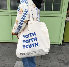 This cute canvas tote bag is an off-white color with blue and black lettering! It has a button enclosure and is great to take along to the beach or to carry a lot of items! It is such a great canvas bag to complete any outfit and for on the go! Dimensions are included in the last image provided! Free Shipping on United States orders only!We provide international shipping!No returns or exchanges but please contact me if you have any issues with your order! Aesthetic Clothing Stores, Eco Tote Bag, Cute Canvas, Cloth Bag, Canvas Shopping Bag, Fresh Look, Canvas Shoulder Bag, Canvas Bag, Cloth Bags