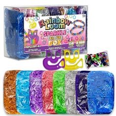 the rainbow party sparkle box is filled with assorted colored plastic beads and streamers