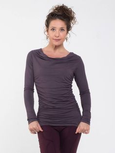 Ruched side panels create a flattering silhouette on one of our best selling long sleeve tops. It features a slightly draped neckline and hit just below the waist. [#details] Size Suggestions S: 2-4 M: 6-8 L: 10-12 [/details] [#fabric] Rayon Lycra: 90% Rayon (Viscose) / 10% Spandex (Lycra) [/fabric] Versatile Long Sleeve Ruched Top, Versatile Fitted Cowl Neck Top, Long Sleeve Top With Thumbholes For Layering, Elastane Long Sleeve Top With Thumbholes For Layering, Fitted Long Sleeve Top With Ruched Sides, Ruched Fitted Long Sleeve Top For Fall, Stretch Ruched Tops For Fall, Fitted Tops With Ruched Sides For Fall, Ruched Tops For Layering In Fall