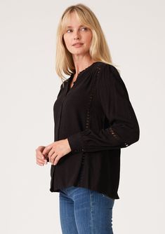 A timeless linen blend bohemian blouse with delicate crochet trim. FINAL SALE Linen blend Crochet-trim Voluminous long sleeve Self-covered button wrist cuff Ruffled neckline Self-covered button-up front Bohemian shirt Delicate crochet trim elevates this essential bohemian blouse. Designed in a cool linen blend, with voluminous long sleeves, a delicate self-covered button front, and a flattering flowy fit. Tuck it into your favorite vintage denim for a classic California boho feel. Model is 5'9, Fall Casual Blouse With Lace Cuffs, Casual Fall Blouse With Lace Cuffs, Bohemian Tops With Button Cuffs And Long Sleeves, Elegant Long Sleeve Tops With Crochet Trim, Elegant Long Sleeve Blouse With Crochet Trim, Chic Long Sleeve Peasant Top With Lace Trim, Spring Long Sleeve Blouse With Crochet Trim, Spring Crochet Trim Long Sleeve Blouse, Bohemian Long Sleeve Blouse With Lace Cuffs