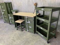 three green storage units with wooden top and metal legs