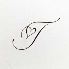 the letter f is made up of two hearts and has been drawn in ink on paper