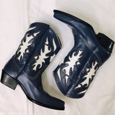 High Quality Name Brand Unknown A Navy Overlaid On White Leather, Trimmed With Yellow And Red Threads The Perfect Blend Of Country And Sophistication, This Western Style Boot Will Turn Heads Everywhere You Go. Wear Them With A Beautiful Full Boho Skirt, A Short Denim Skirt, Or A Pair Of Cutoffs These Boots Are Going To Look Fabulous. Full-Grain Leather Upper 8” Shaft Snip Toe Leather Lining Cushioned Footbed Leather Outsole Western Heel Excellent Barely Worn Condition. The Vibe Is ...Cowgirl Boots, Leather Boots, Western Boot, Western Wear Barely Worn, Like New The Vibe Is ...Cowgirl Boots, Leather Boots, Western Boot, Western Wear Our Closet’s Vibe(S) Brunch Cocktai Blue Boots With Snip Toe For Fall, Blue Snip Toe Boots For Fall, Blue Fall Boots With Snip Toe, Blue Western Boots With Almond Toe, Navy Cowboy Boots, Blue Snip Toe Boots With Reinforced Heel, Blue Western Almond Toe Boots, Navy Blue Cowgirl Boots, Blue Cowboy Boots Ankle