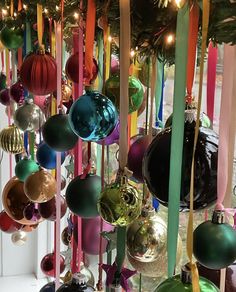 a bunch of ornaments hanging from the ceiling