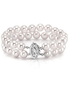 This beautiful Akoya pearl bracelet consists of beautiful and lustrous pearls in AA+ quality. The option to upgrade to AAA quality pearls are available for an additional fee. All pearls in this bracelet are round and are strung with silk thread and double-knotted between each pearl. This bracelet comes standard with a beautiful 14K gold clasp, though premium clasps can be selected for an additional cost. Known as the 'icon' of cultured pearls, Akoya pearls have graced the necks, ears, fingers, Formal White Pearl Bracelets, Formal White Pearl Embellished Bracelets, Classic Pearl White Bracelet, Formal Pearl Bracelet With Round Beads, Classic Pearl Bracelet With Oyster Style, Classic Pearl Bracelet With Oyster Detail, Anniversary Akoya Pearl Bracelet In Pearl White, Timeless White Pearl Jubilee Bracelet, Timeless White Akoya Pearl Bracelets