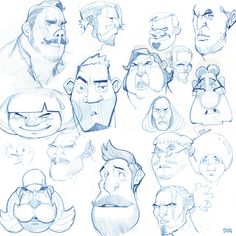 some cartoon faces are drawn in pencil on paper, and each has different facial expressions