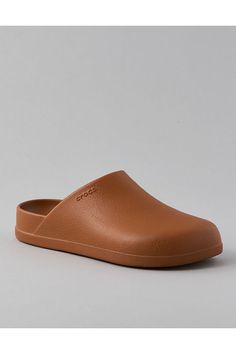 Subtle texture on upper mimics appearance of genuine, full-grain leather/Deep heel cup for extra comfort and improved fit/Single-piece molded Croslite™ for long-lasting durability/Iconic Crocs Comfort™: Lightweight. Flexible. 360-degree comfort. Brown Clogs With Textured Footbed And Round Toe, Modern Synthetic Clogs With Slip-resistance, Comfortable Brown Synthetic Clogs, Brown Synthetic Mules With Leather Footbed, Comfortable Brown Synthetic Mules, Brown Synthetic Clogs With Removable Insole, Brown Slip-on Clogs With Textured Footbed, Brown Synthetic Mules With Removable Insole, Brown Synthetic Clogs With Leather Footbed