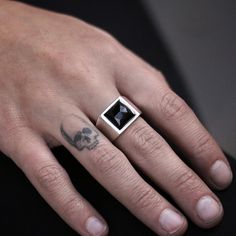 A handmade sterling silver 925 square shaped onyx stone signet ring. Each ring is cleaned and polished with care. The weight of the ring may vary according to size. Top measurements: Width - 13mm | Hight - 13mm Approx weight: 8.14gr The ring is set with one square shaped, rose cut black onyx stone. *The ring is hollowed out from the inside* This ring is made to order! Please allow up to 21 business days to be made before shipment. If you have any further questions, please don't hesitate to conta Minimalist Silver Onyx Signet Ring, Modern Onyx Signet Ring For Gift, Modern Onyx Signet Ring Gift, Modern Silver Rings With Rectangular Stone, Modern Silver Ring With Rectangular Stone, Modern Black Sterling Silver Signet Ring, Modern Sterling Silver Rings With Rectangular Stone, Modern Sterling Silver Jewelry With Square Cut, Black Sterling Silver Rectangular Signet Ring