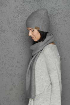 "THE SET of the GRAY snood and cap - warm, soft merino wool garment. Luxury and exclusive accessory. Snood and cap are made of very luxury merino wool yarn, thats why it's very soft. This garment is suitable even for the alergic people. Because of the knitting print, this cap will fit both - small and big headed people. It doesn't loses form wearing it. Composition - 70% merino wool, 30% alpaca wool. Dimensions: Scarf - Width- 30 cm / 11,81\", length - 185 cm/ 72,83\". Cap - Width- 42 cm/ 16,54\ Casual Merino Wool Scarf For Winter, Elegant Knitted Scarves For Winter, Cozy Merino Wool Scarves For Winter, Winter Wool Knitted Scarves, Hand Knitted Wool Scarves For Winter, Winter Scarf Gift, Cap Winter, Alpaca Cardigan, Light Cardigan