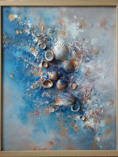 an abstract painting with seashells and blue paint