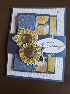 an anniversary card with sunflowers on it