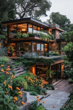 a house that is surrounded by trees and plants