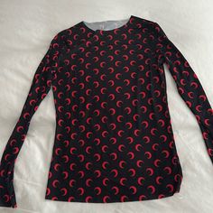 Red And Black Stretchy Moon Shirt. Unbranded. Never Worn. Super Stretchy And Can Fit Up To A Large! Fitted Red Top With All Over Print, Black Long Sleeve Top With Moon Print, Fitted Black Tops With Moon Print, Red Long Sleeve Top With All Over Print, Fitted Moon Print Crew Neck Top, Fitted Moon Print Tops For Summer, Red Crew Neck Tops For Night Out, Red Fitted Printed Shirt, Fitted Printed Red Shirt