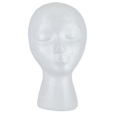 a white mannequin head with eyes closed and one eye open, on a white background