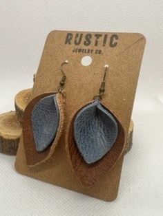 Take a look at our handcrafted, genuine double leather earrings!  These one-of-a-kind accessories will give your outfit a unique, eye-catching touch. The high-quality leather is lightweight and comfortable for all day wear. Whether you're going out on the town or just want something special, they make a great gift for any occasion. All earrings come with clear earring backs which are recommended for wear. Handmade Faux Leather Dangle Jewelry, Leather Leaf Earrings, Jewellery Making Ideas, Clear Earrings, Leather Leaf, Rustic Jewelry, Ear Candy, Lightweight Earrings, Light Weight Earrings