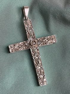 A 14 carat white gold cross pendant in a early Art Deco design. Featuring 38 rose cut diamonds in a geometrical ajour (cut out) motif. This piece of impressive craftsmanship is showing characteristics of the Belle Époque and Art Deco period. Provenance: probably Southern Europe, ca. beginning of the 20th century. The bale might be of later date, since the v-shaped bale is not characteristic for the period. Dimensions: 40 x 28 mm. Gross weight: 4.02 g. Note: this pendant comes without a necklace, Golf Necklace, White Gold Cross Pendant, Southern Europe, Gold Cross Pendant, Diamond Cross Pendants, Diamond Cross, Art Deco Period, Gold Cross, Cluster Earrings