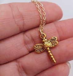 "Sweet and Small Dragonfly Necklace Small Gold Dragonfly suspended on a delicate 18\" Gold Vermeil Necklace. Your Gold Dragonfly Necklace will arrive in an organza pouch with a matching polishing cloth. Gift packaging cheerfully provided upon request!" Gold Dragonfly Necklace For Gift, Adjustable Dragonfly Necklace For Gifting, Adjustable Dragonfly Necklace For Gift, Deer Necklace, Cactus Earrings, Organza Pouch, Dragonfly Jewelry, Dragonfly Necklace, Dragonfly Pendant