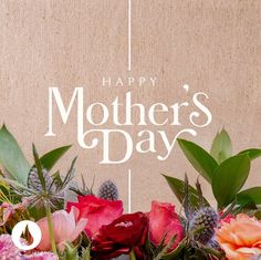 a mother's day card with flowers and greenery