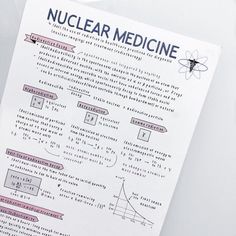 a close up of a piece of paper with writing on it that says nuclear medicine