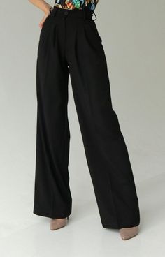 "Trousers \"palazzo\".  Elegant fabric premium. Perfect black colour. Classic high-waist palazzo pants. It has two folds on the front. High-quality and beautiful costume fabric, plastic and elegant. It has side pockets. We will sew white or black color to order.  Made to order, please enter your measurements in the personalization section. We need your waist, hips and desired trousers length measurements, please enter them in the personalization section . It is also possible to sew in small whol High Waist Black Wide Leg Pants For Office, Classic Black Wide Leg Pants For Evening, Classic High-waisted Wide Leg Pants For Party, Black Wide Leg Full Length Pants For Office, Black Wide Leg Dress Pants For Formal Occasions, Classic Black Wide Leg Evening Pants, High Waist Black Dress Pants For Formal Occasions, Black Full Length Wide Leg Pants For Office, Black High Waist Dress Pants For Formal Occasions