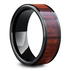 a black ceramic ring with wood inlay