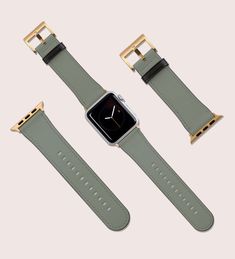 two apple watch bands with gold buckles on each side and one in the middle