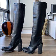 - Designer = Haider Ackermann - Size = 9m(39) -Haider Ackermann Rustic Black Genuine 1leather Made In Italy Block Heel 9m Boots - Heel Height = 5” Inches - Height = Measured At Bottom Tip Of Block Heel To Tip Edge Of Boots = Approximately 57.5cm - Circumference Measured At Topmost 2part Of Boots All Around = Approximately 37cm - Circumference Measured At Sheen Of Boots = Approximately 35.5cm - Genuine And Authentic Or Your Money 2back - Unique And Eye Catching Style And Design. Designer Leather Heeled Boots With Sculpted Heel, Designer Leather Boots With Stacked Heel, Designer Leather Boots With Sculpted Heel, Designer Heeled Boots With Stacked Heel, Designer Leather Heeled Boots With Snip Toe, Leather Sock Boots, Boots Heel, Tall Leather Boots, Haider Ackermann