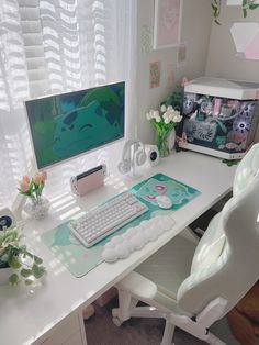 a white desk with a computer on it