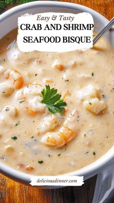 a white bowl filled with shrimp and shrimp seafood bisque on top of a wooden table