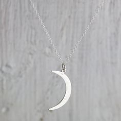 Large Sterling Silver Crescent Moon Necklace. Simple and Elegant this sterling crescent moon necklace is the perfect piece for layering! » Sterling Silver Crescent Moon Charm (31mm including jump ring x 10mm) with tiny 925 genuine Sterling mark on back. » Sterling Silver Cable Chain (select from drop-down on upper right) » Your jewelry purchase will come beautifully packaged for gift giving. Personalize It: ✧ Add a Birthstone Crystal: http://etsy.me/2v0gADY ✧ Add an Initial Charm: http://etsy.me Everyday Moon Shaped Sterling Silver Charm Necklace, Everyday Moon Shape Sterling Silver Charm Necklace, Everyday Sterling Silver Moon Charm Necklace, Silver Crescent Charm Necklace For Everyday Wear, Everyday Moon Charm Necklaces, Everyday Moon Charm Necklace, Everyday Half Moon Phase Necklace, Crescent Moon Print Jewelry As A Gift, Everyday Silver Crescent Charm Necklace