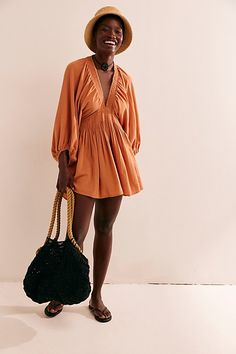 The definition of romantic, this mini from our free-est collection will turn heads with every wear. **Fit:** Relaxed, A-line silhouette **Features:** Plunge V-neckline, billowy banded sleeves, smocked waist, back keyhole button closure **Why We | For The Moment Mini Dress by free-est at Free People in Orange, Size: M Free People Arzel Mini Dress, Free People Antoinette Mini, Sporty Sneakers, Romantic Style, Boho Outfits, Dresses For Sale, Smocking, Fashion Dresses, Knitwear