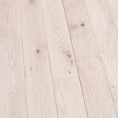 an image of white wood flooring that looks like it has been cleaned and is ready to be used