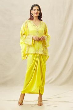 Yellow full sleeve top with zardozi, bead, cutdana, thread embroidery in floral pattern. Paired with sleeveless blouse and draped skirt. - Aza Fashions Long Sleeve Resham Embroidery Pre-draped Saree For Festive, Designer Long Sleeve Tops For Diwali, Long Sleeve Tops With Dabka Work For Wedding, Embroidered Pre-draped Saree With Long Sleeves For Reception, Long Sleeve Tops For Reception And Festivals, Long Sleeve Tops For Receptions And Festivals, Yellow Long Sleeve Sets For Reception, Yellow Long Sleeve Reception Set, Designer Long Sleeve Tops For Navratri