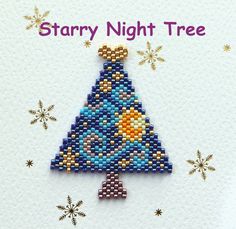 a cross stitch christmas tree ornament with snowflakes and stars around it