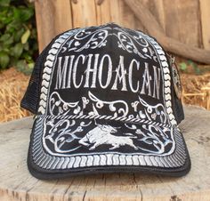 MICHOACAN embroidered bull colored western hat trucker cap Western Style Baseball Cap With Short Brim, Western Style Snapback Hat, Western Style Adjustable Trucker Hat With Curved Bill, Western Style Hats With Curved Bill For Rodeo, Western Style Curved Bill Hat For Rodeo, Western Style Trucker Hat For Festivals, Western Trucker Hat For Festivals, Western Black Snapback Hat For Rodeo, Black Trucker Hat With Short Brim For Rodeo