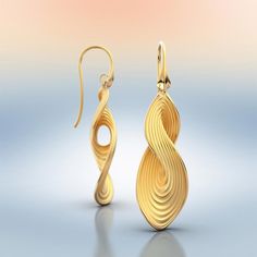 Elevate your style with long, ribbed 14K or 18k gold twisted drop earrings, expertly crafted in Italy by Oltremare Gioielli Italian jewelry. Discover luxury in every detail, featuring polished edges for timeless elegance. Explore Italian craftsmanship at its finest today. 14K or 18k gold 45mm long 12mm large designed and crafted in Italy Real Gold Earrings, Earrings Real, Solid Gold Earrings, Italian Jewelry, Long Drop Earrings, Italian Luxury, Stunning Jewellery, Real Gold, Italian Design