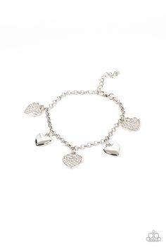 Shiny silver heart charms delicately alternate with white rhinestone encrusted heart frames along a silver chain around the wrist, resulting in a flirtatious fringe. Features an adjustable clasp closure.

 Sold as one individual bracelet. Locket Bracelet, White Bracelets, Heart Frame, Paparazzi Accessories, Rhinestone Heart, White Rhinestone, Rhinestone Bracelet, Paparazzi Jewelry, Pink Rhinestones