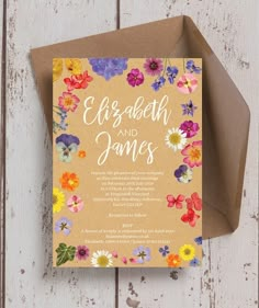 an open card with flowers on it and the words evening reception written in white ink