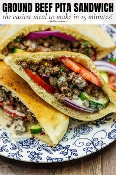 ground beef pita sandwich on a blue and white plate with text overlay that reads ground beef pita sandwich the best meal to make in 15 minutes