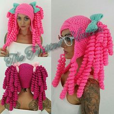 a woman wearing pink crocheted hair with long braids