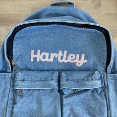 "The cutest backpack! I love how casual and simple these are. Choose from initial, name, or first and middle name on these lightweight denim bags. The back measures 15.7\" x 11.7\"8 and comes with two smaller front pockets, a main large pocket and adjustable shoulder straps. These backpacks are the perfect size for toddlers and kids but adults as well! If you are wanting a different design, size, more wording, or a different clothing style, please send me a message so we can discuss the details. Casual Backpack With Embroidered Logo, Casual Standard Backpack With Embroidered Logo, Denim Blue Cotton School Backpack, Casual Backpack With Embroidered Logo For Daily Use, Casual School Bag With Embroidered Logo, Casual Personalized Everyday Bag, Casual Embroidered Backpack For Everyday Use, Casual Everyday Personalized Bags, Casual Embroidered Standard Backpack