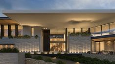 an architectural rendering of a modern house at night with lights on the windows and stone walls