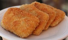 three fried food items on a white plate