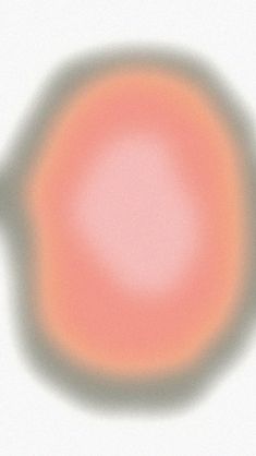 a blurry image of an orange circle on a white background with a gray border