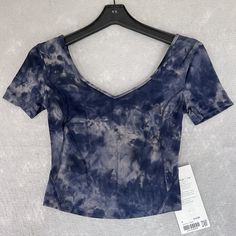 Up For Sale: Lululemon Tee Womens 4 Diamond Dye Lunar Rock Cropped Slim Yoga Short Sleeve $74 Condition: Nwt Please Use And Compare The Provided Photo Measurements To Your Own For Best Fit Take Full Advantage Of Bulk Purchase With Combined Shipping On Multiple Item Orders. Orders Goes Out Every Day So Expect A Quick Delivery! A Tracking Number Is Also Provided For Confirmation Question? Please Write A Comment Below Or Message. I Answer Most Questions Instantly! Similar Items Are Listed Daily, Sa Lululemon Summer Athleisure Tops, Blue Casual Tops With Medium Support, Casual Blue Tops With Medium Support, Lululemon Fitted Short Sleeve Activewear, Fitted Lululemon Activewear Short Sleeve, Fitted Lululemon Tops For Summer, Lululemon Moisture-wicking Short Sleeve Top, Blue V-neck Yoga Top, Blue V-neck Top For Yoga