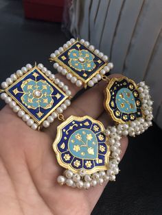 Traditional Enamel Jewelry With Matching Earrings, Handmade Enamel Earrings For Wedding, Kundan Jhumkas With Motifs For Gifts, Kundan Jhumkas With Motifs As A Gift, Gold Chandbali Earrings With Motifs, Traditional Mirror Work Jhumkas As Gift, Traditional Jhumkas With Mirror Work Gift, Traditional Chandbalis With Mirror Work As Gift, Eid Jewelry With Motifs As Gifts