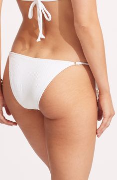 A textured fabric brings wavy flair to these timeless bikini bottoms complete with side ties for a personalized fit. Side ties Moderate back coverage 95% nylon, 5% elastane Hand wash, dry flat Imported Textured Fitted Bottoms For Beach Season, Textured Tie-side Bottom Swimwear For Beach, Fitted Textured Bottoms For Beach, Textured Fitted Bottoms For Beach, Textured Fitted Bottoms For The Beach, Textured Beachwear Bottoms For The Beach, Textured Beachwear Bottoms For Beach, White Tie-side Bottoms For Sunbathing, Hairstyling Products